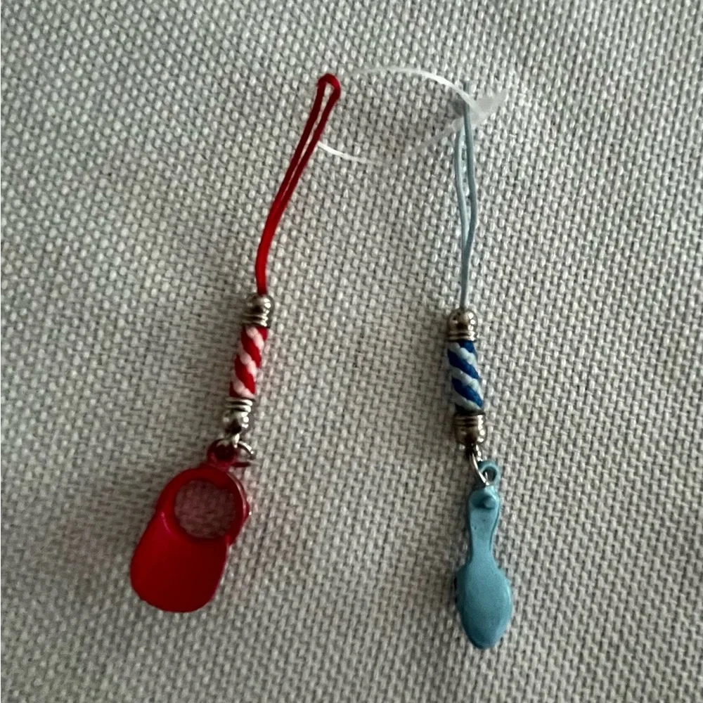 Fun sandal and sun visor phone charms.
